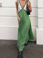 Elle | Chic dress with pointed neckline